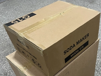 Packaging area with color boxes and master cartons